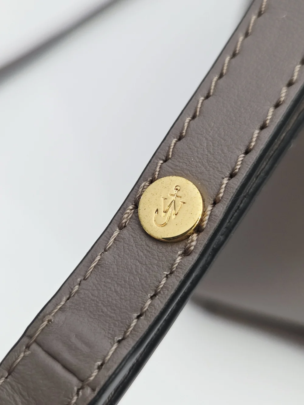 JW ANDERSON THE JWA SMALL CORNER BAG - TAUPE LEATHER